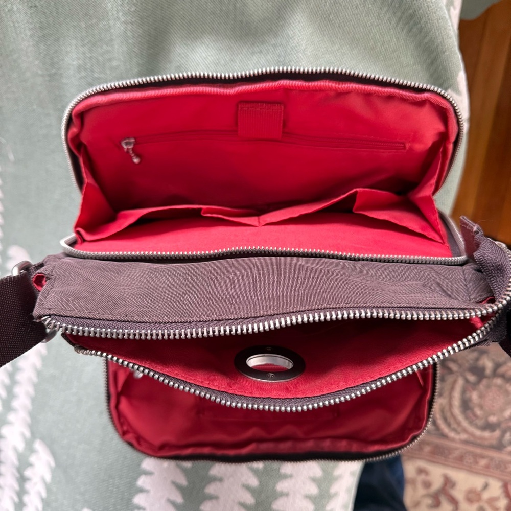 Baggallini Brown Calais Crossbody with contrasting inners and swivel turn-lock.